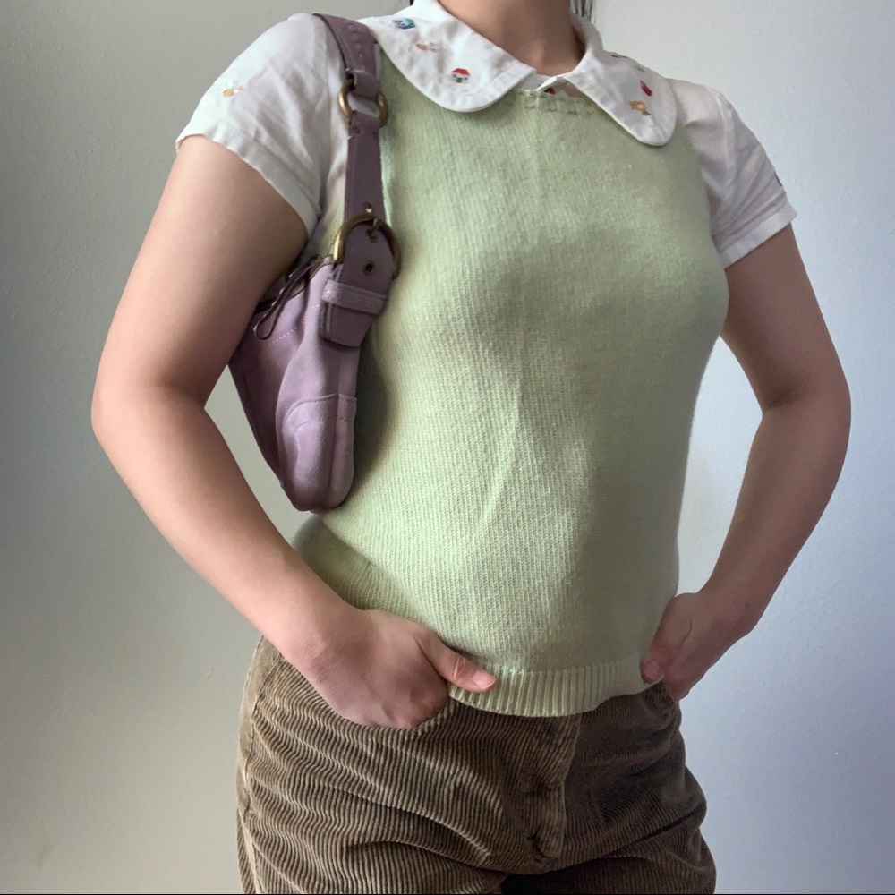 green sweater vest
